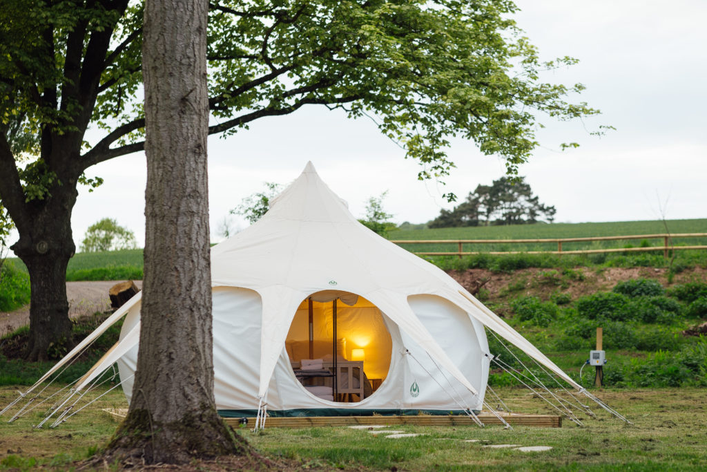 yoga retreats a glamping pod surrounded by trees